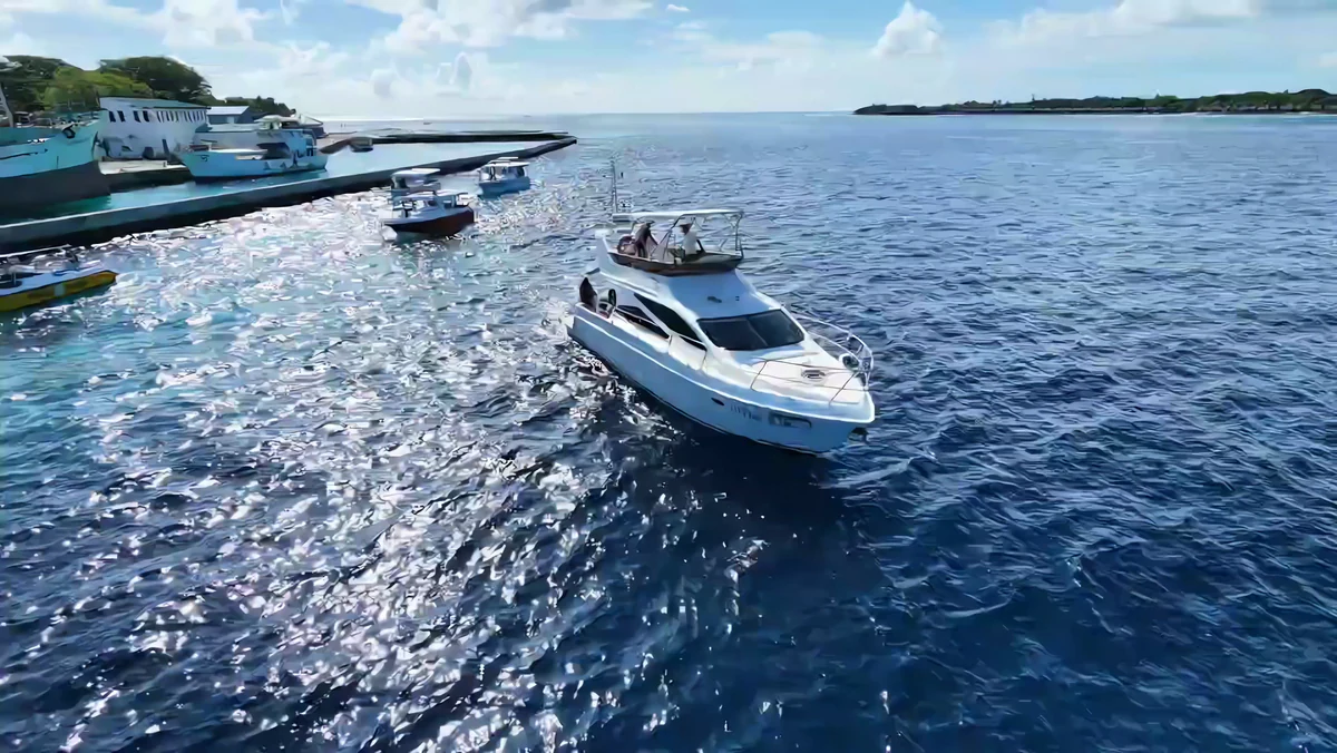 Tiffany Blanc 14 leaving Hulhumalé Marina, seen from the air